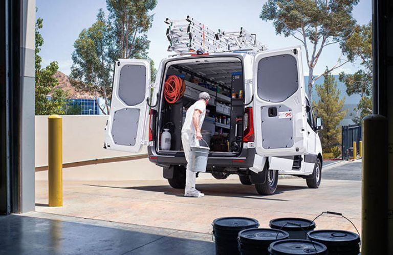2025 Mercedes-Benz Sprinter van with cargo and a man
