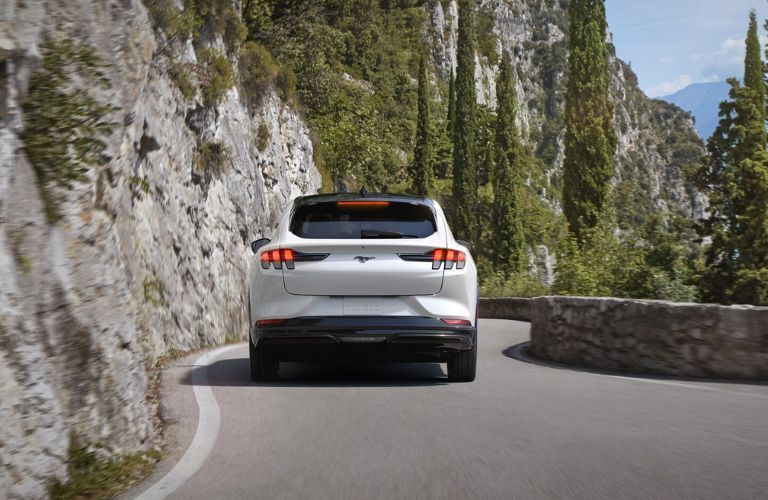 2024 Ford Mustang Mach-E on a road on a hill