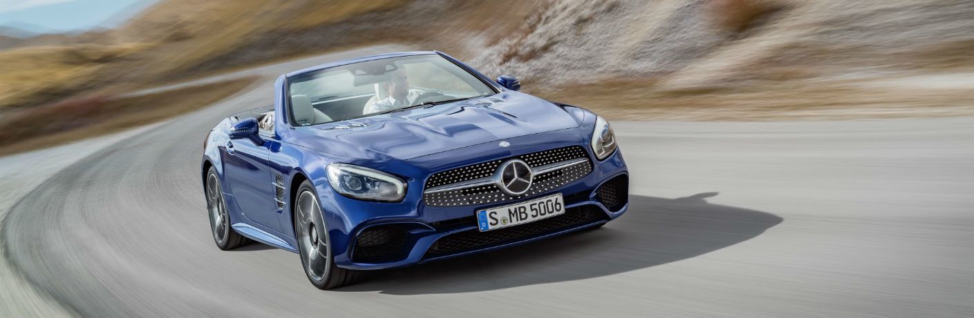 Blue 2017 MB SL Driving on a Highway with Top Down