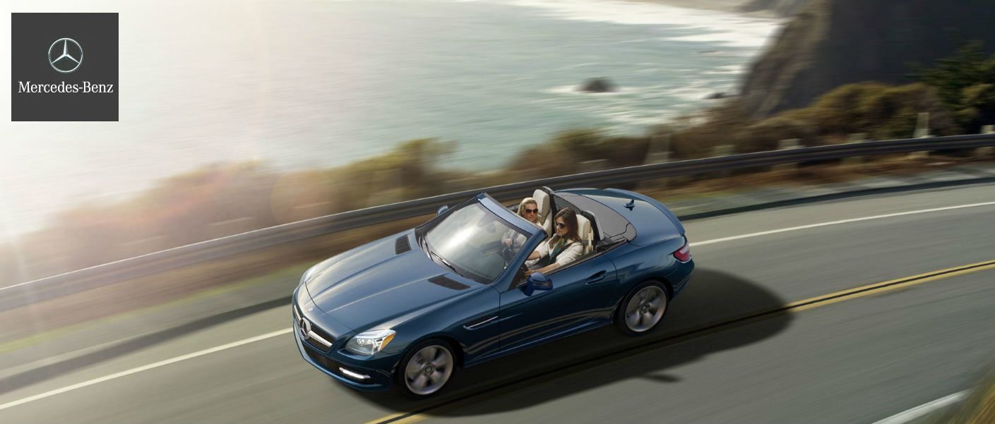 2015 Mercedes-Benz SLK-Class driving along coastal cliff highway