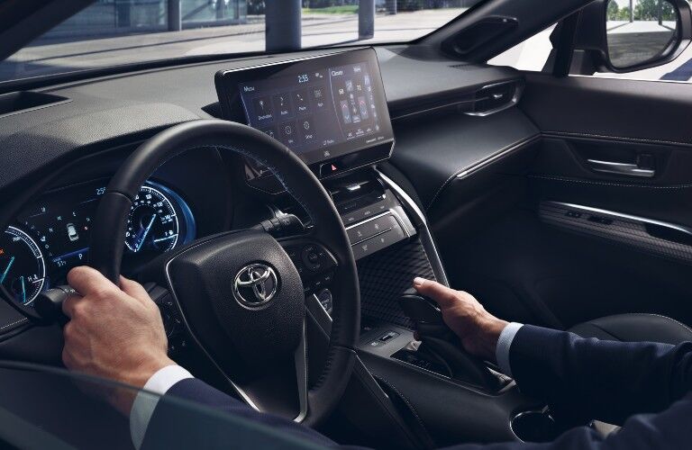 2021 Toyota Venza interior holding wheel and shifter