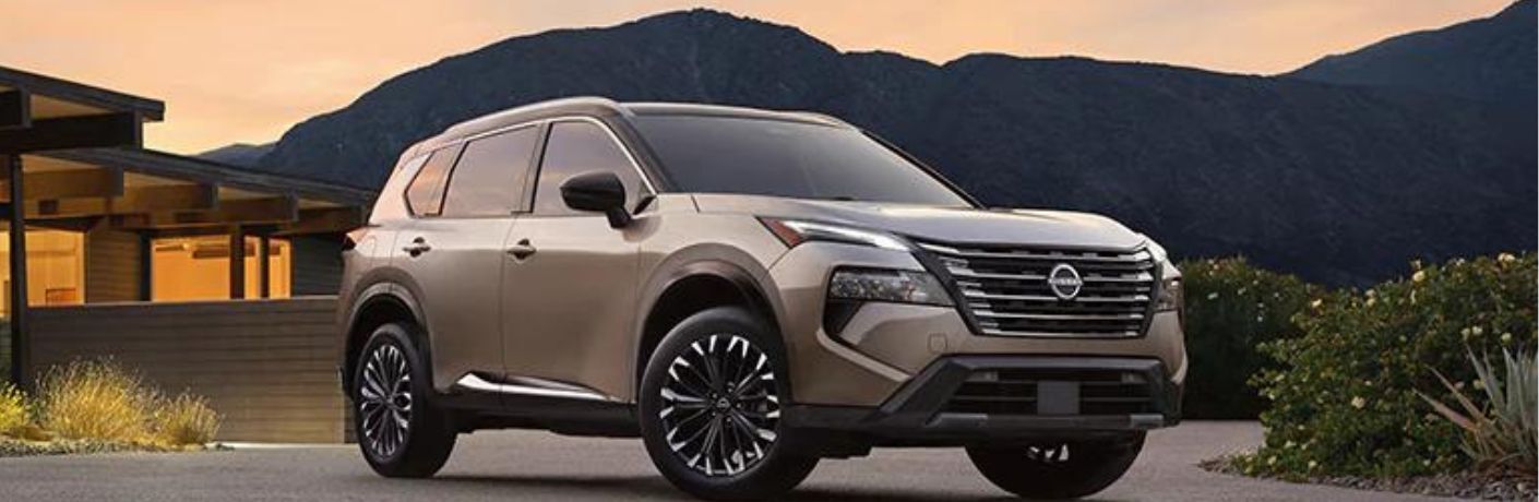 2024 Nissan Rogue side and front view