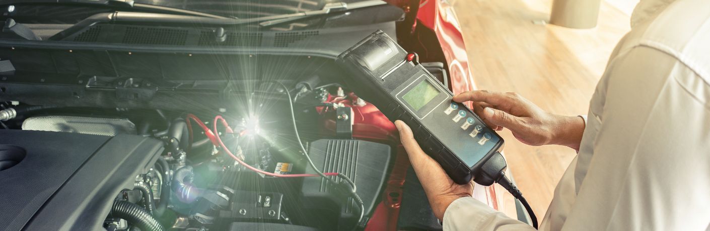 technician checking a battery