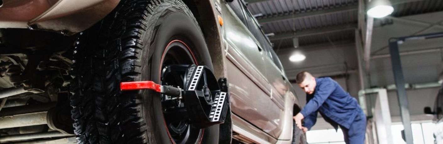 A car undergoing auto wheel alignment