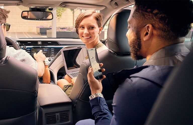 2021 Toyota Camry Hybrid people in cab