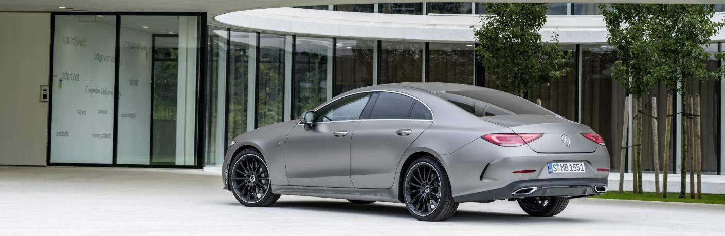 2019 Mercedes-Benz CLS Coupe parked in front of a modern building
