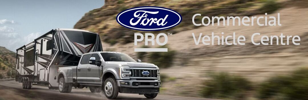 2024 Ford Super Duty pulling a trailer on a road