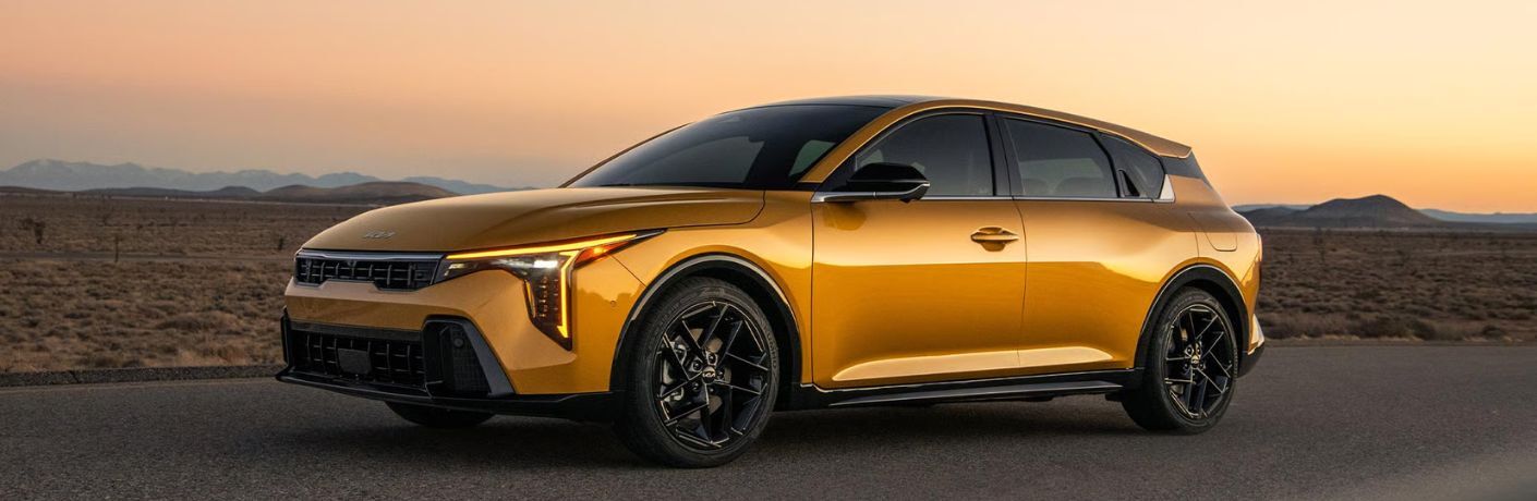 2026 Kia K4 side view at sunset