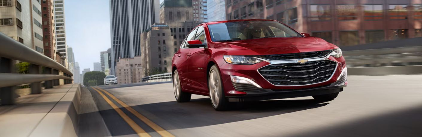 Chevrolet Seda in a city road