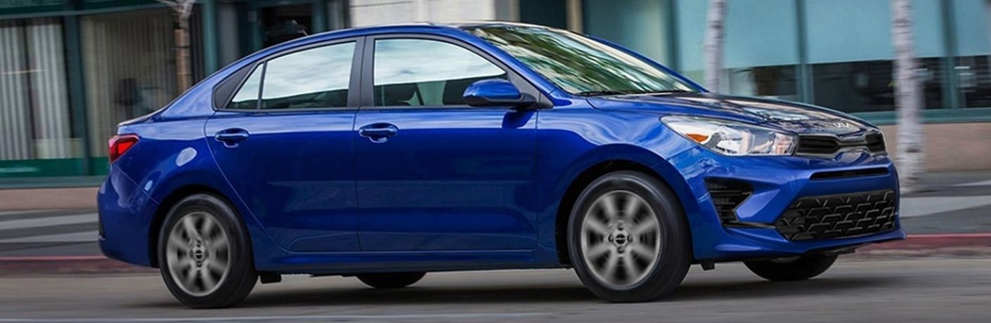 Blue 2022 Kia Rio Side Exterior on a City Street