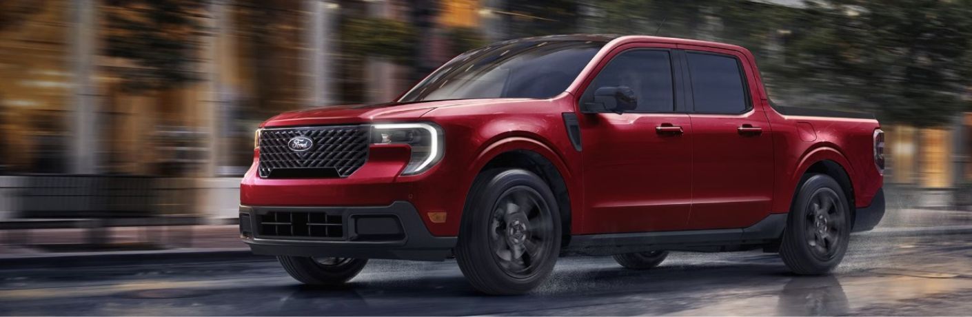 2026 Ford Maverick in red driving in a city