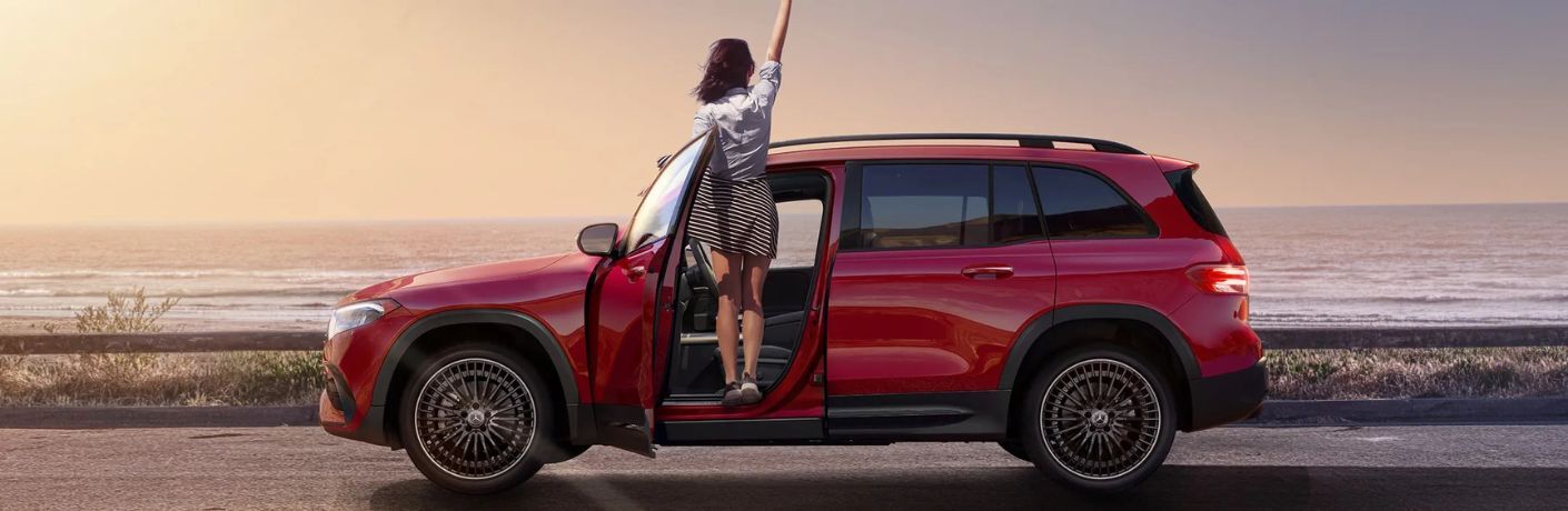 Mercedes-Benz EQB side view parked by water