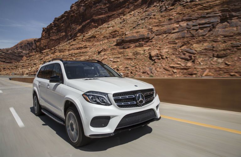 2017 MB GLS exterior front fascia and passenger side on desert highway
