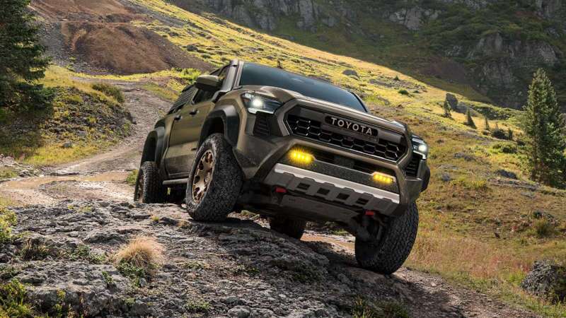 A front exterior view of the Toyota Tundra tackling challenging terrain