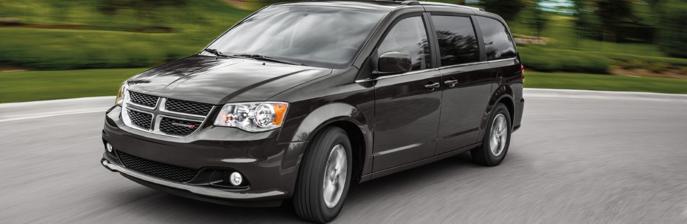 Front three-quarter view of the 2020 Dodge Grand Caravan driving