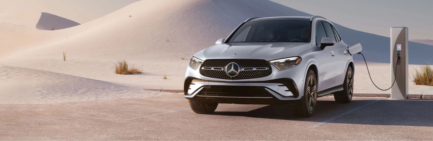 A Mercedes-Benz vehicle plugged in to charge