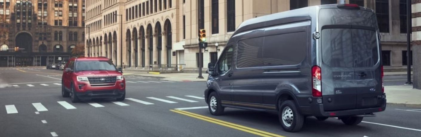 2024 Ford Transit driving in a city