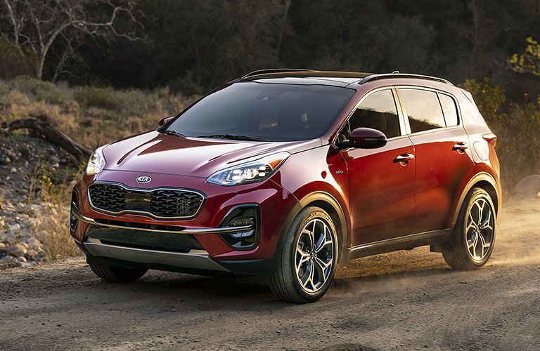 2020 Kia Sportage driving on dirt road