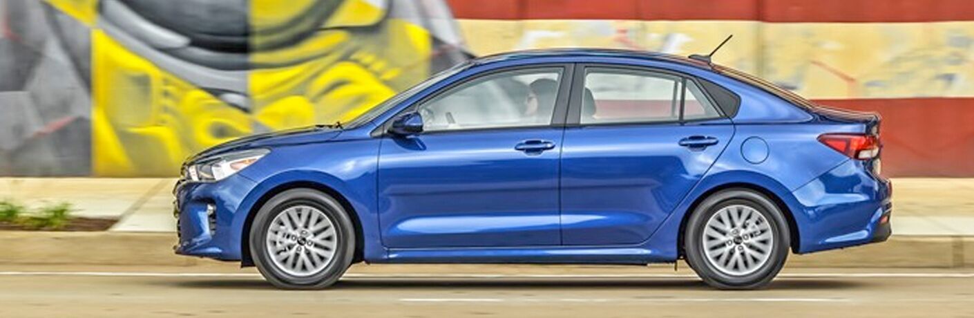 Side view of blue 2020 Kia Rio