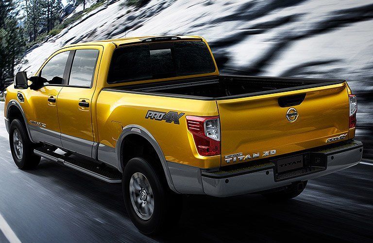 Titan driving down road