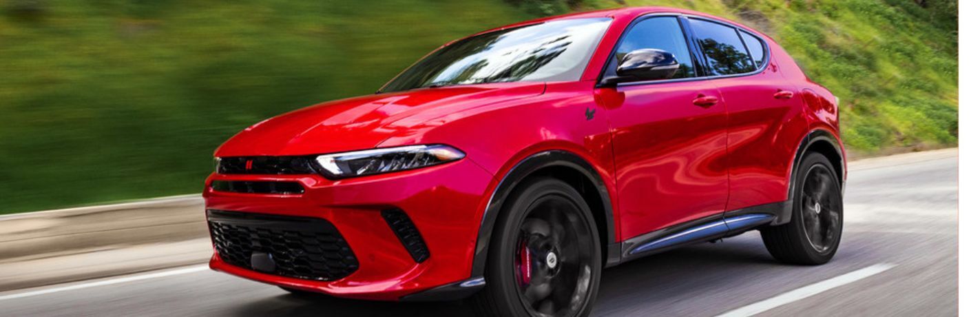 2024 Dodge Hornet Red driving on the road