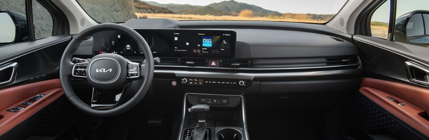 2026 Kia Carnival steering wheel and dashboard