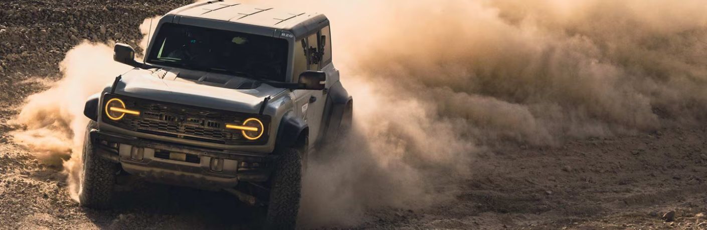 2025 Ford Bronco Raptor front and side view in sand