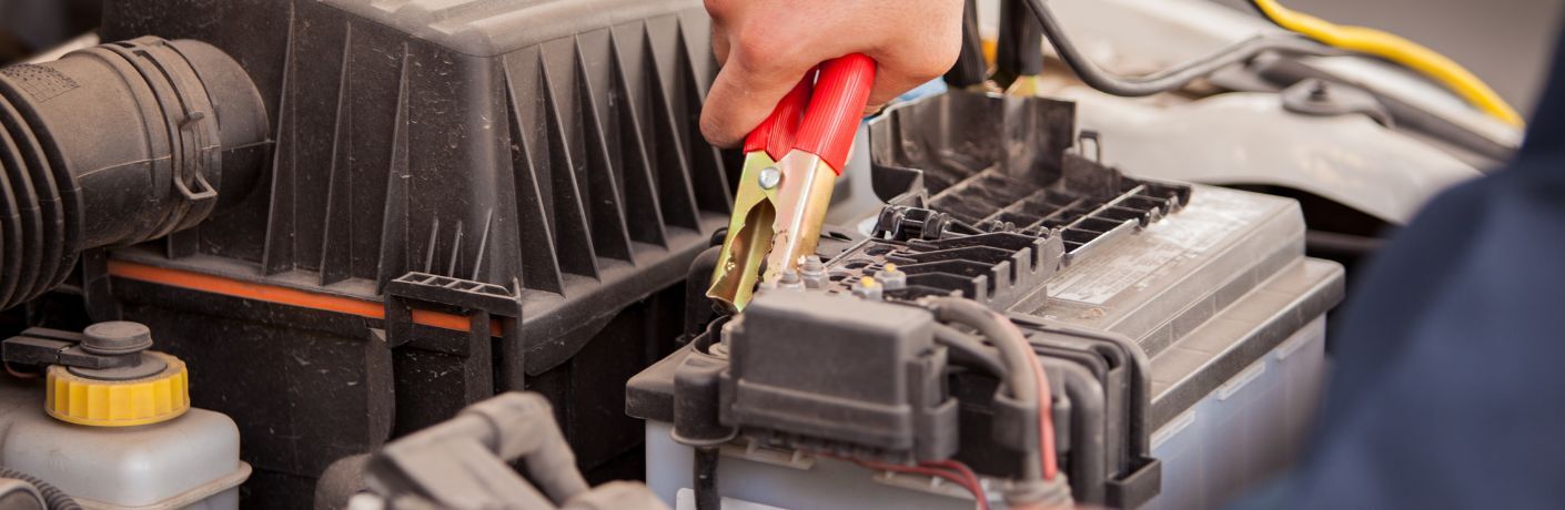 technician working on a battery