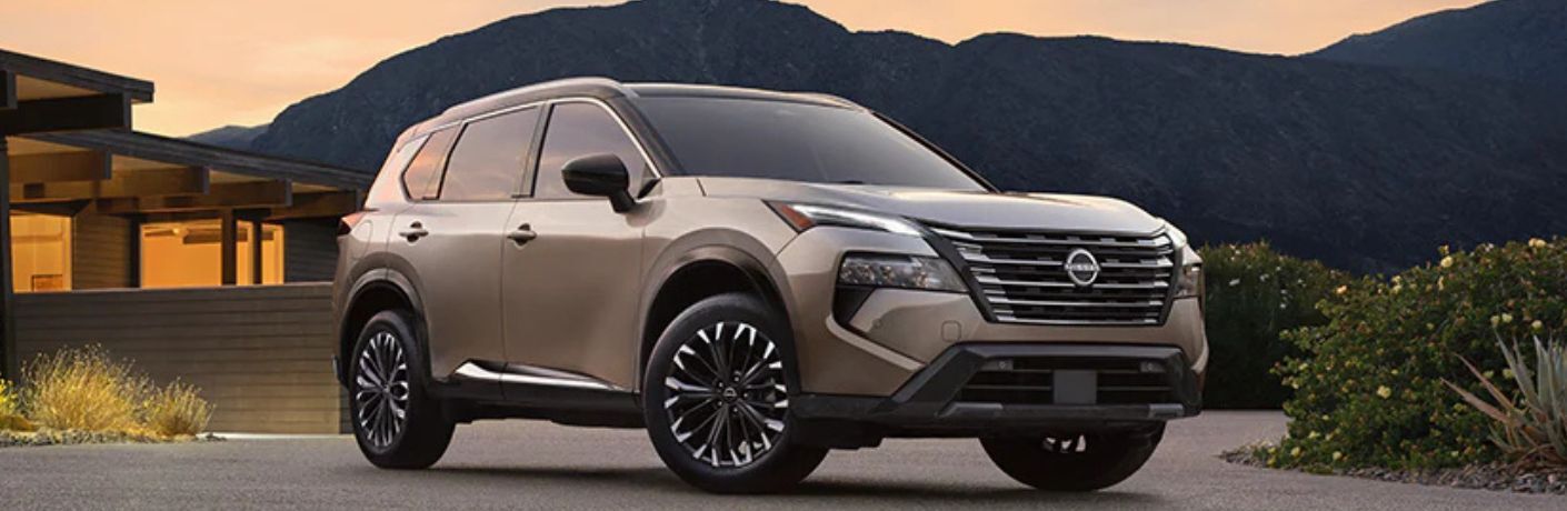 2025 Nissan Rogue side and front view