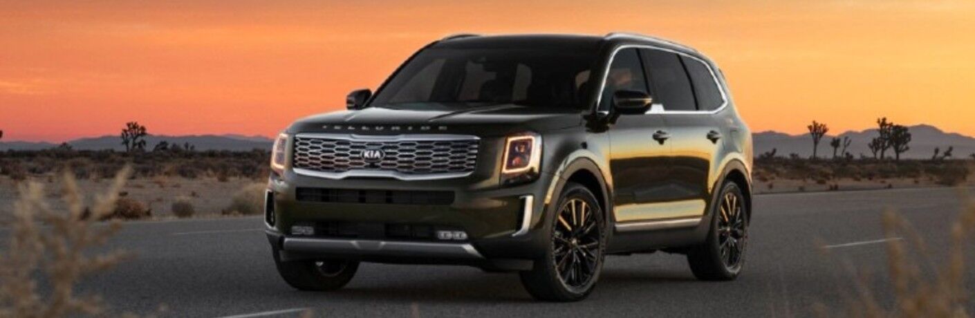 2021 Kia Telluride parked in front of sunset background
