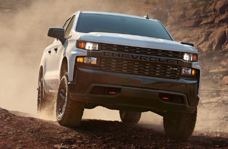 A 2021 Chevrolet Silverado on a rugged terrain