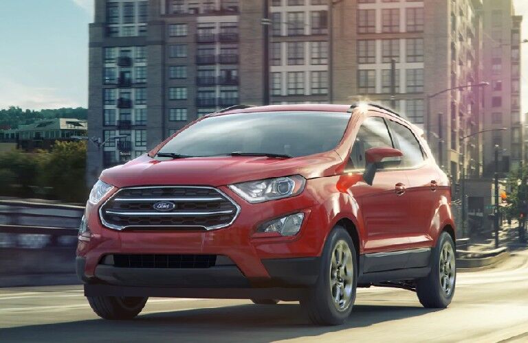 red 2021 Ford EcoSport front view in a city
