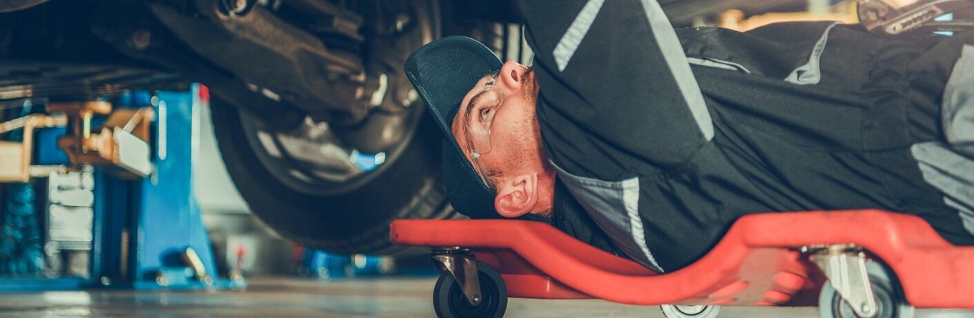 Transmission being inspected by a mechanic