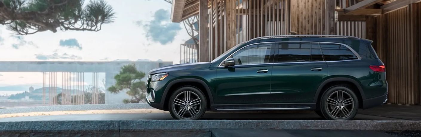 Side view of the 2024 Mercedes-Benz GLS 450 4MATIC® SUV in Emerald Green