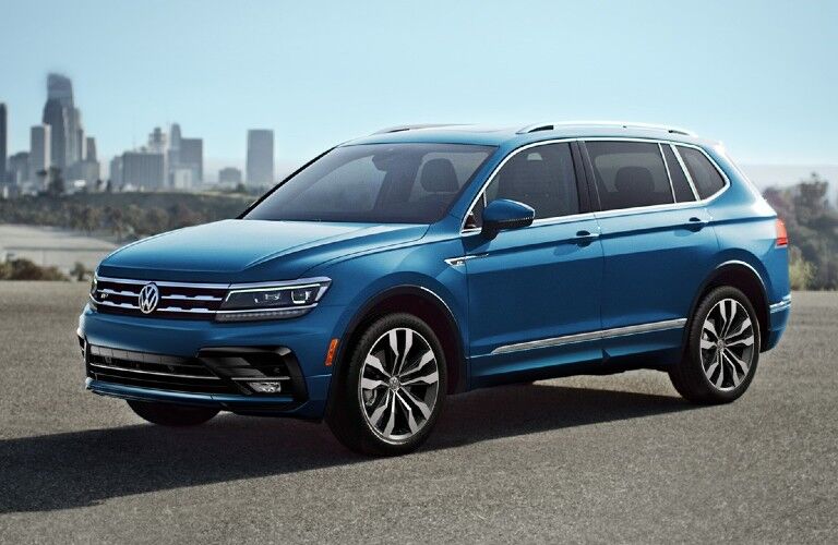 Front driver angle of a blue 2020 Volkswagen Tiguan