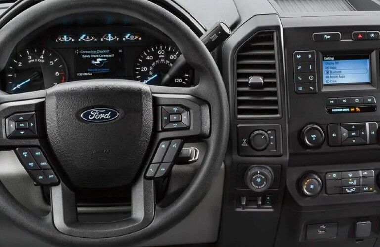 Steering wheel and centre touchscreen inside 2020 Ford F-150 XLT
