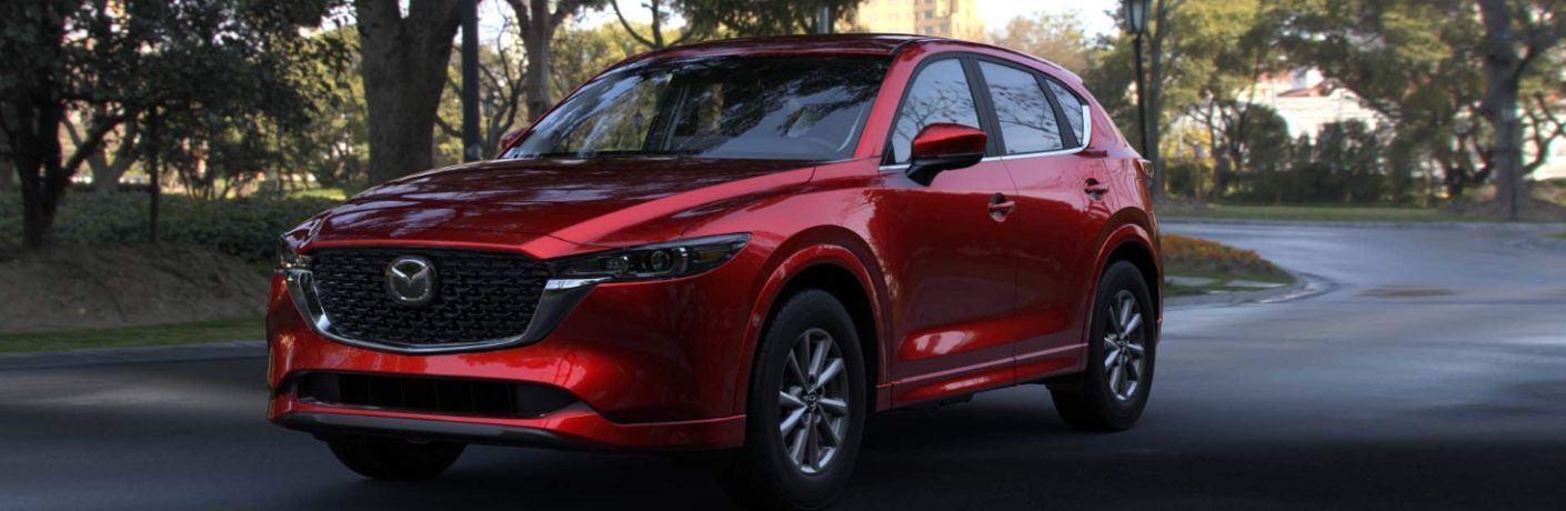 2024 Mazda CX-5 2.5 S Select front quarter view on the road