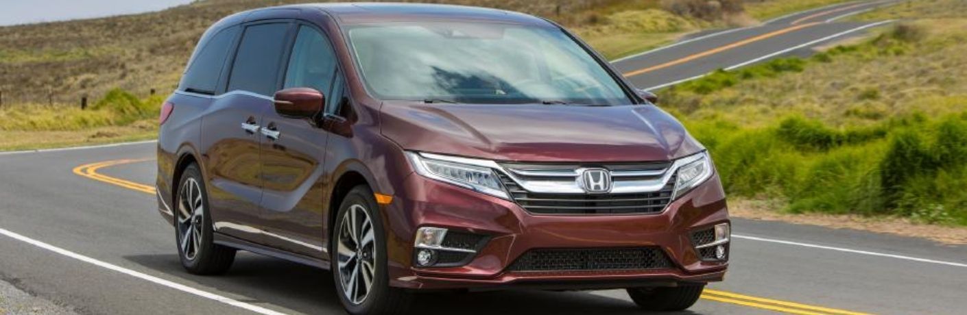 A 2019 Honda Odyssey speeding on a road
