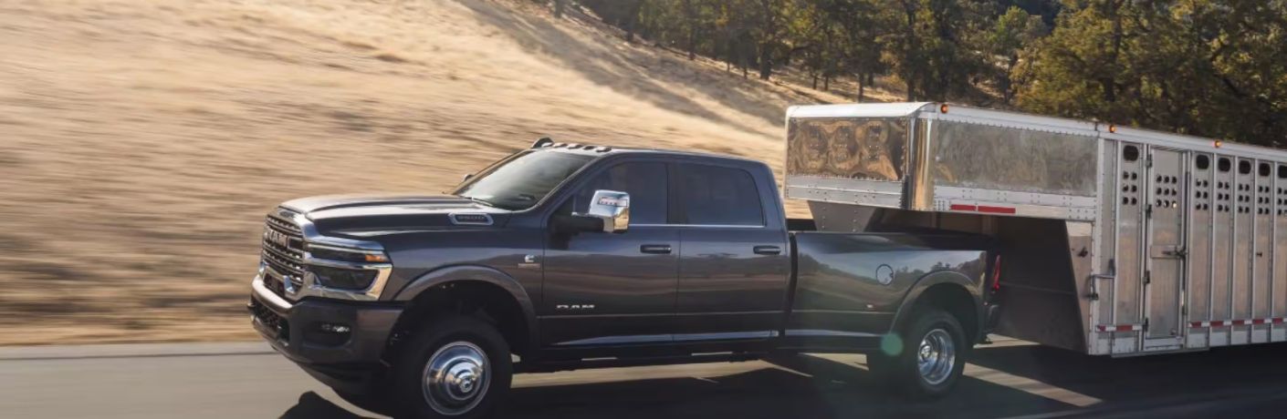 Side view of the Ram 3500 towing a trailer