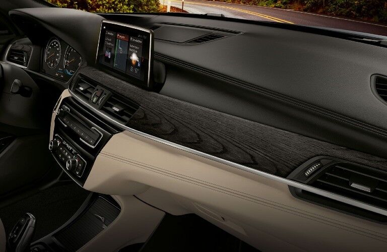 2021 BMW X1 interior sloped dashboard from passenger perspective