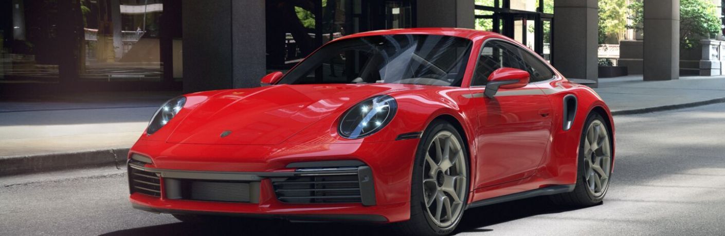 2025 Porsche 911 Turbo 50 Years parked outside a building