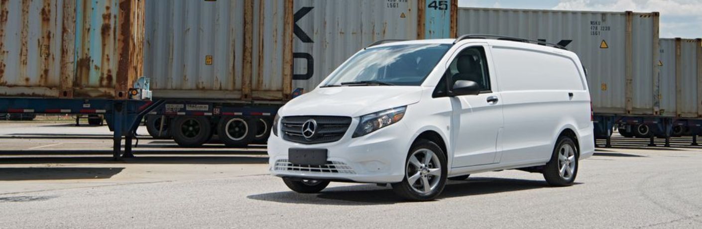 Mercedes-Benz Metris Passenger Van parked near a storage site