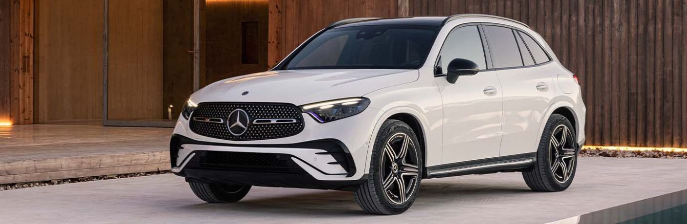 Used Mercedes-Benz GLC 300 SUV White parked outside a house