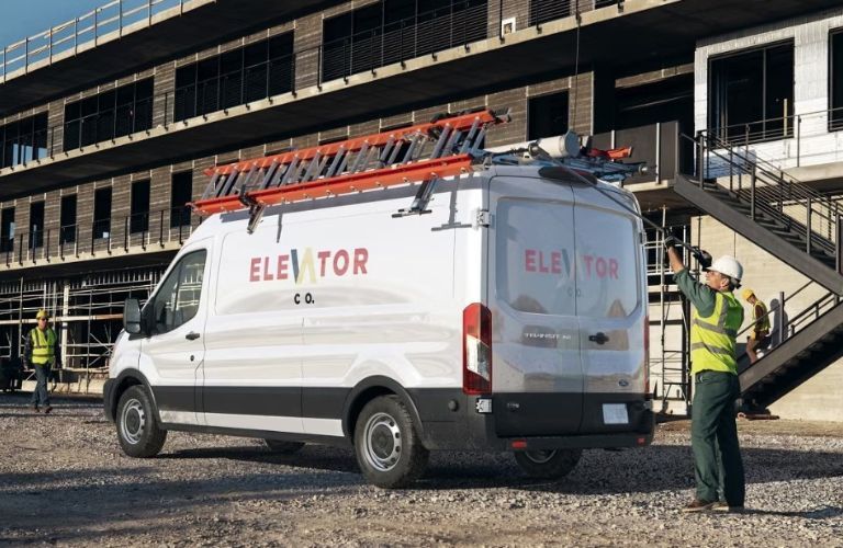 2024 Ford Transit rear and side view on work site