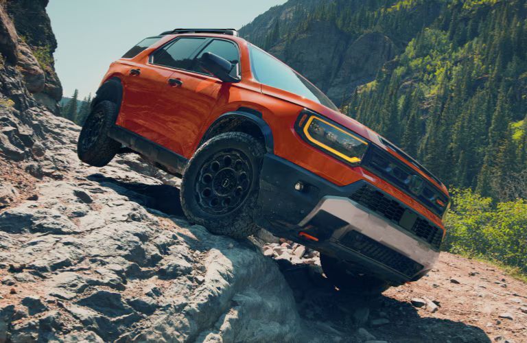 2025 Honda Passport Orange off-roading
