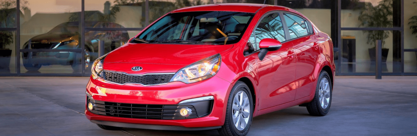2016 Kia Rio parked in front of a building