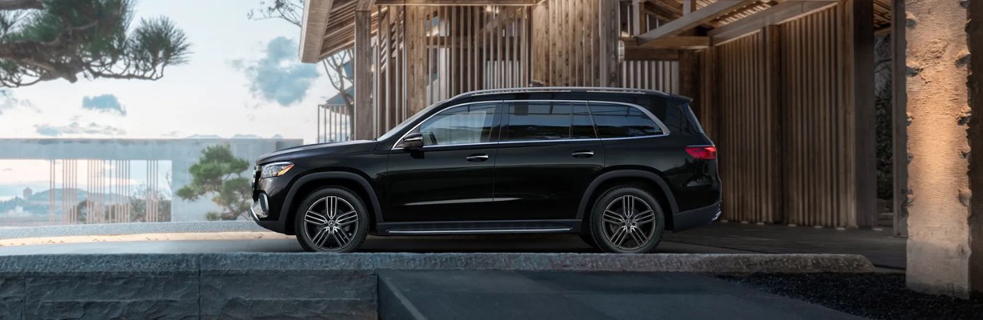 2025 Mercedes-Benz GLS side view in a driveway