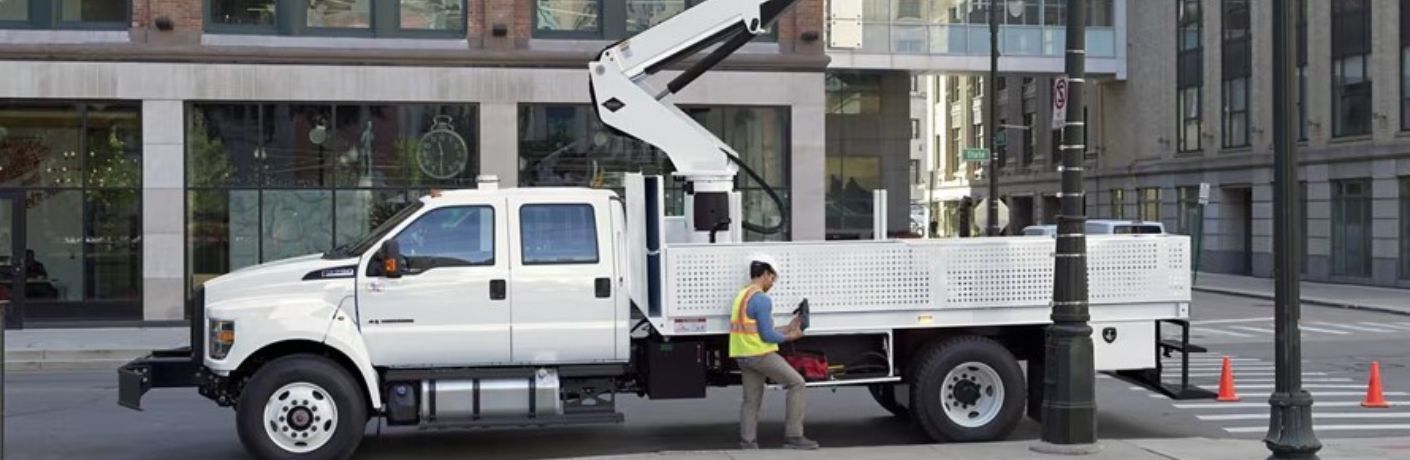 2025 Ford Medium Duty side view in a city