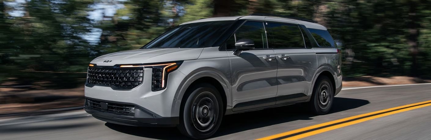 2026 Kia Carnival MPV Hybrid exterior front side view