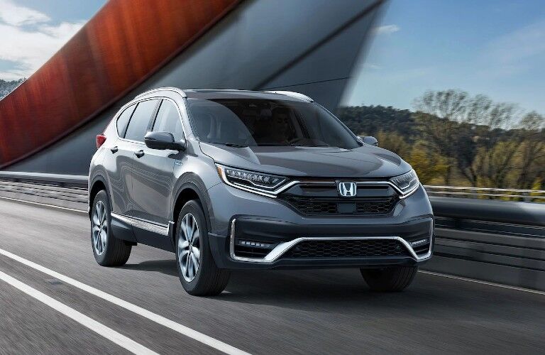 Front passenger angle of a grey 2021 Honda CR-V Hybrid